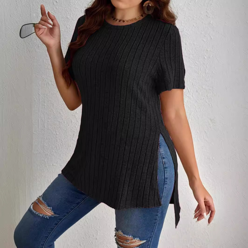 Moteriškas viršus iš riboto pynimo megztinio su apvaliu kaklu, trumpomis rankovėmis, šoninis įkirpimas; poliesteris 90–95%, spandeks <30%