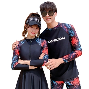 Γυναικείος ολόσωμος μαγιό με φούστα, μακριά μανίκια, φερμουάρ και επένδυση στήθους — εκτύπωση, ύφασμα πολυεστέρα 82%, επένδυση 95% πολυεστέρα