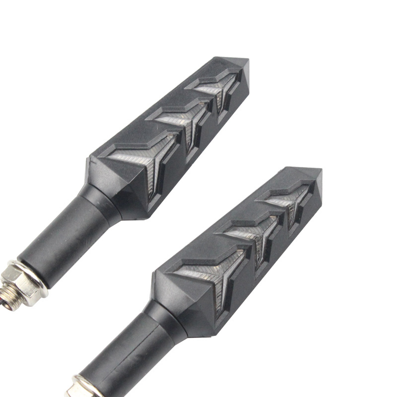 LED divkrāsu pagrieziena signāls motociklam ar Y formas dizainu un zivju kaula motīvu; Modelis: Two-color Lamborghini turn light; Spriegums: 12V; Jauda: 3W; Materiāls: ABS+LED; Darbības ilgums: 10000h