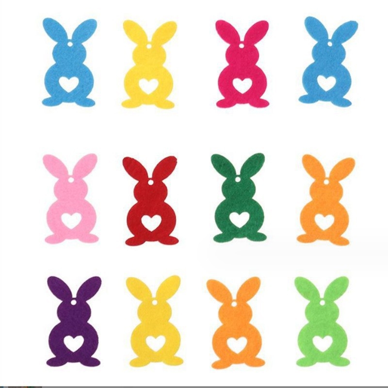 Velykų medinis kabantis ornamentas – kiškio formos, perforuotas dizainas, šiuolaikinio meno stilius, spausdinimo technika