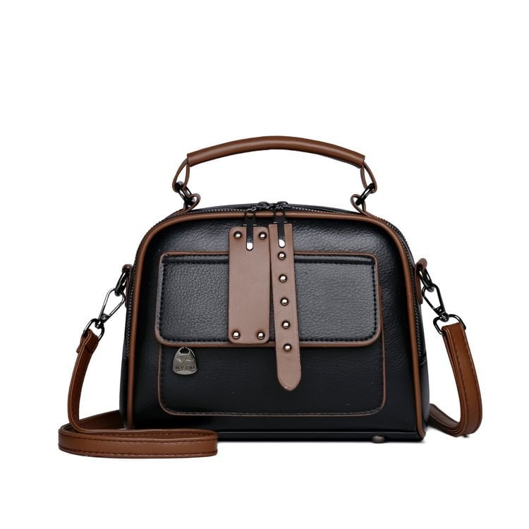 PU kvadratinė pečių krepšys su metaliniais detalėmis, užtrauktukas, poliesterio padas; vidinės kišenės: užtrauktukinė kišenė, telefono kišenė, ID kišenė; vienas pečių diržas; horizontali kvadrato forma.