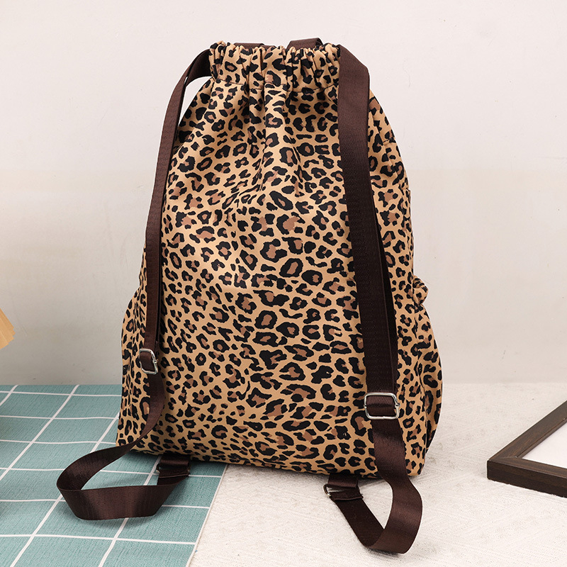 Leopárd mintás húzós hátizsák, 20–35L nylonból, iskola és edzés céljára, ívelt vállpántokkal, 15 hüvelykes laptop befogadására alkalmas, hétköznapi utazáshoz