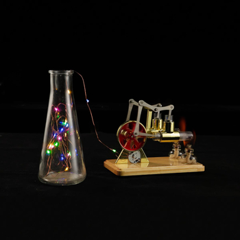 Izglītojošais Stirling ģeneratora modelis ar paralēlām stienēm; pamata model ģenerē elektrību bez uzstādīšanas, klasiskais model prasa uzstādīšanu; koka apakšējā plāksne; piemērots 15–35 gadiem.