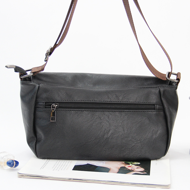 Vīriešu pleca soma - minimalistisks horizontālais dizains, retro pilsētas stils; PU materiāls, poliestera odere, vienkrāsains raksts; ultralēta, izturīga pret nolietojumu