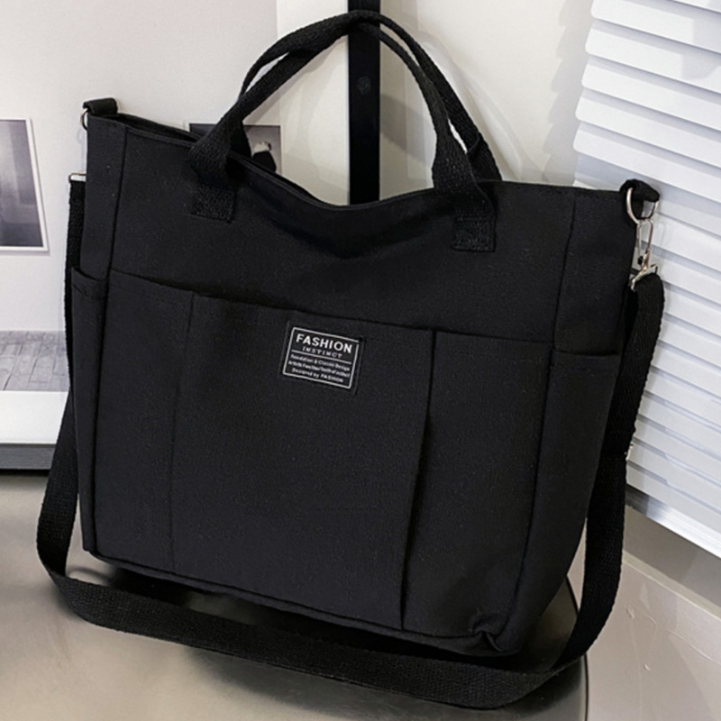 Tote rankinė iš storesnio audinio, didelė talpa, keli kišenės, vieno pečių/crossbody stilius, logotipas spausdintas termotransferu, Guangzhou kilmė