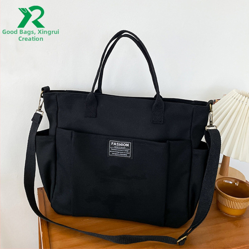 Tote rankinė iš storesnio audinio, didelė talpa, keli kišenės, vieno pečių/crossbody stilius, logotipas spausdintas termotransferu, Guangzhou kilmė