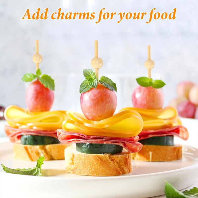 Vienkartiniai bambukiniai vaisių iešmeliai, 1.8 mm storio, 100 vnt./pakuotė, biologiškai skaidūs; tinka vaisiams, duonai, kokteiliams ir burgeriams; pritaikomi