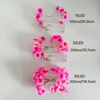Vario laidininko LED girlianda, gėlių žiedlapių formos, maitinama baterijomis, rankinis jungiklis, IP42, tarnavimo trukmė apie 2000 valandų, dekoracijoms kieme ir miegamajam