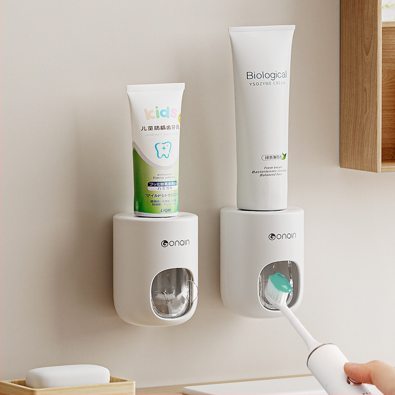 Automatinė dantų pastos spaudiklis — Kiss; paprasta kategorija; bendram naudojimui; privatūs ženklinimai įmanomi; vienas vienetas.