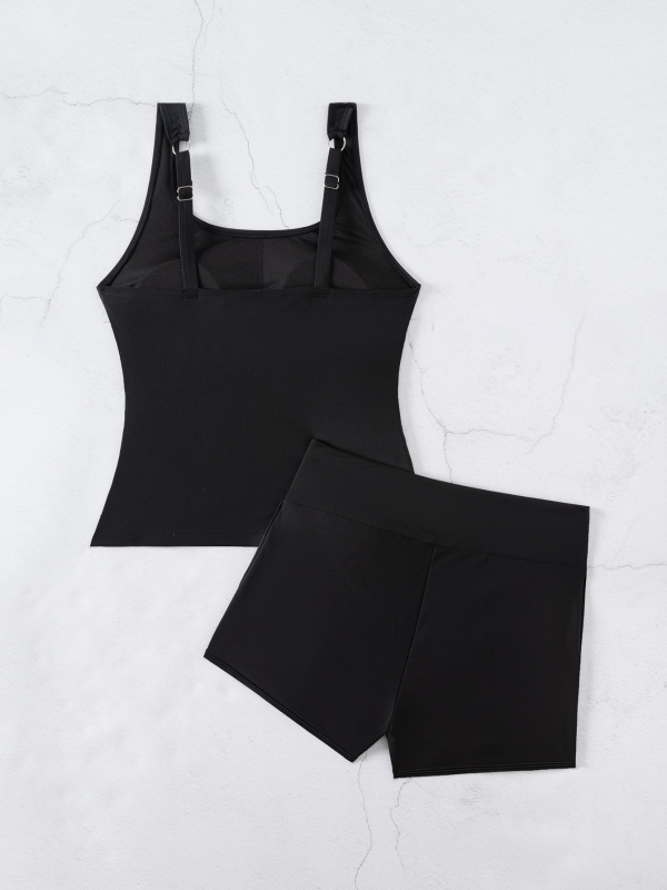 Set Tankini fără mânece, decolteu pătrat; top cu buzunar lateral și pernă pentru bust, fără suport metalic; material: nylon 82% cu căptușeală poliester; partea inferioară: slip tip briefs.