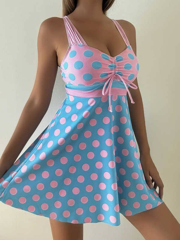 Szoknyás stílusú egyrészes fürdőruha, pöttyös mintázat, ujjatlan, poliészter-spandex anyag, bélés poliészter-spandex 95%, 190 g