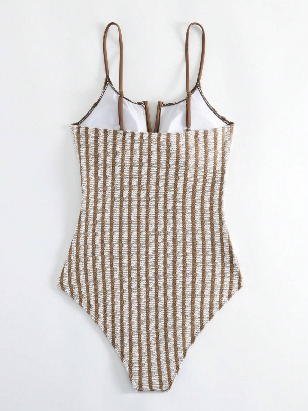 Costum de baie întreg cu dungi pentru femei, fără mâneci, cu pernă pentru bust; exterior: poliester cu 82% spandex, căptușeală: poliester cu 18% spandex.