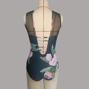 Γυναικείο ολόσωμο μαγιό με ανοιχτή πλάτη, πάνελ από δίχτυ και φλοράλ εκτύπωση; Υλικό: πολυεστέρας, περιεκτικότητα πολυεστέρα 85%; Επένδυση πολυεστέρας 90%; κατάλληλο για κολύμβηση