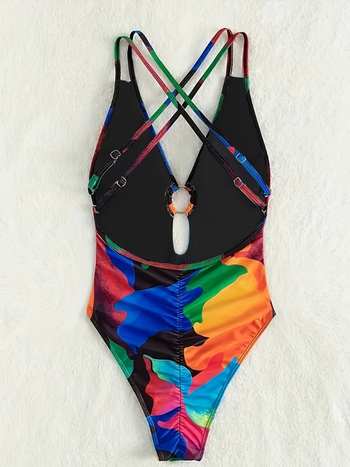 Μονόσωμο μαγιό; βαθύ V στην πλάτη με διασταυρούμενο ιμάντα; ενισχυτικά για το στήθος; ύφασμα πολυεστέρα-σπαντεξ 82/18; επένδυση πολυεστέρα.