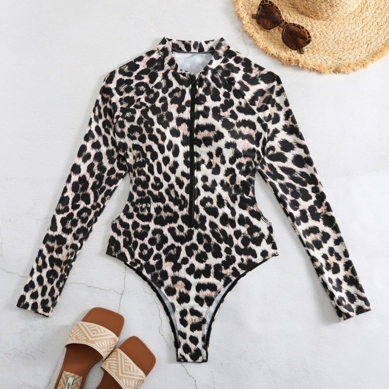 Jednodjelni ženski kupaći kostim s leopard uzorkom, dugi rukavi, s umetkom za prsni dio (82% poliester; 18% elastan)