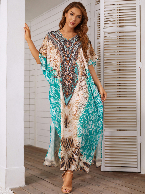 Rochie-cover-up de plajă cu imprimeu floral; material poliester-elastan cu uscare rapidă; guler rotund; mâneci batwing; talie lejeră