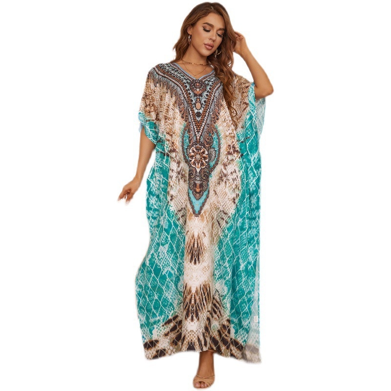 Rochie-cover-up de plajă cu imprimeu floral; material poliester-elastan cu uscare rapidă; guler rotund; mâneci batwing; talie lejeră