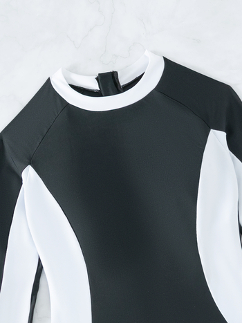 Μαγιό ολόσωμο με μακριά μανίκια, ψηλή μέση, ύφασμα πολυεστέρα που στεγνώνει γρήγορα, επένδυση πολυεστέρα και ελαστάνη 18%