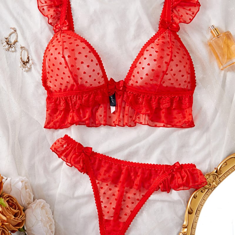 Γυναικείο εσώρουχο με διαφανές δαντελένιο ύφασμα από νάιλον με κέντημα σε σχήμα καρδιάς; βασικός ιστός 90–95% νάιλον.