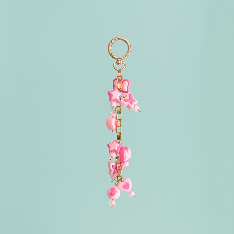 Somas kulons: akrila burta, pītā aukla, pērļu lodīšu akcenti (Modeļa B386)