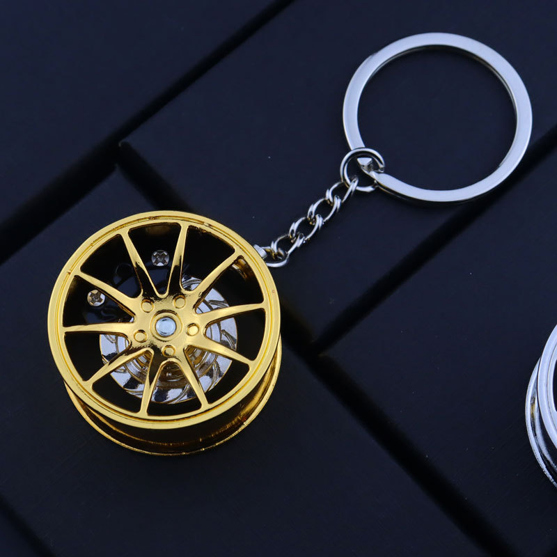Ключодържател за автомобил, метал, луксозен стил, интегриран въртящ се спирачен елемент, подходящ за рекламни подаръци и подаръци за срещи