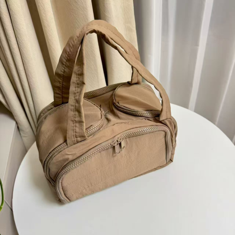 Geantă de cosmetică de mână cu capacitate mare, exterior din nylon, căptușeală din poliester, design monocrom, stil urban simplu, unisex, primăvara 2024