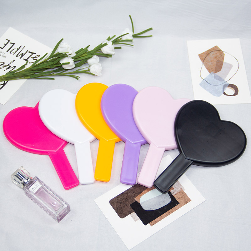 Šmink ogledalo s držalom u obliku srca, jednostrana, plastični okvir, aluminijsko ogledalo, otisak logotipa i prilagodba dostupni