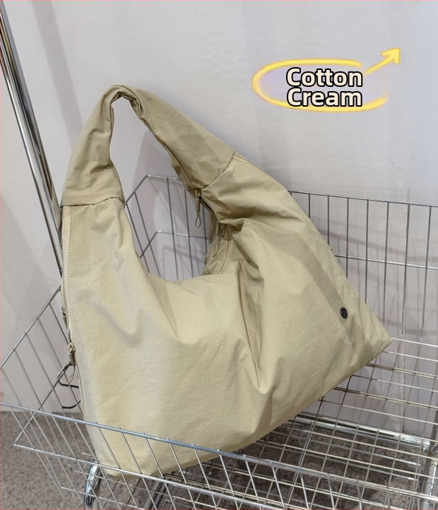 Bou bou plecu soma, parašū audums, horizontāla kvadrātforma, rāvējslēdzējs, kokvilnas odere, iekšējā kabata portatīvajam datoram un laminēta rāvējslēdzēja kabata