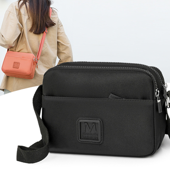 Τσάντα για κάμερα σε στυλ αστικής απλότητας, νάιλον, οριζόντια τετράγωνη μορφή, με φερμουάρ για άνοιγμα και κρυφό τσέπη με φερμουάρ, επένδυση πολυεστέρα.