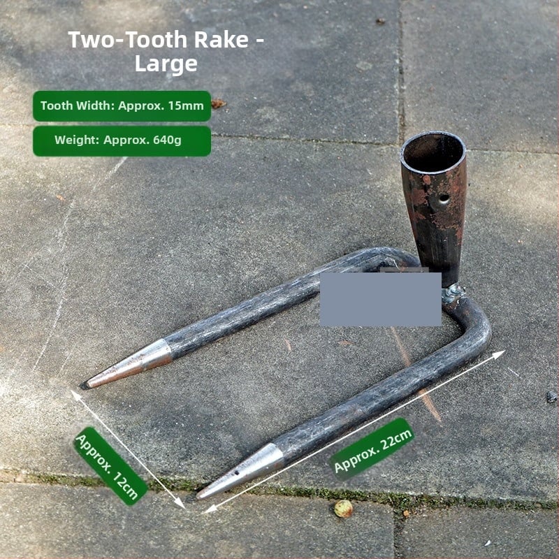 Vrtna metalna grablja sa dva zuba i hvataljkom