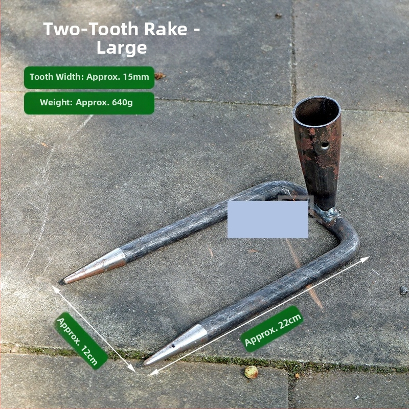 Vrtna metalna grablja sa dva zuba i hvataljkom