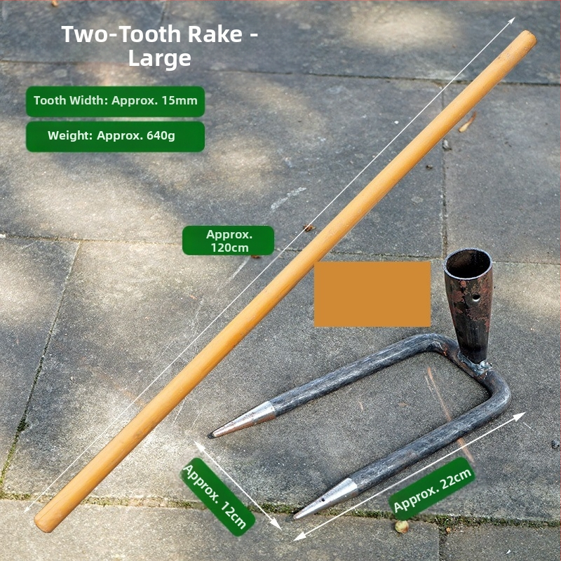 Vrtna metalna grablja sa dva zuba i hvataljkom