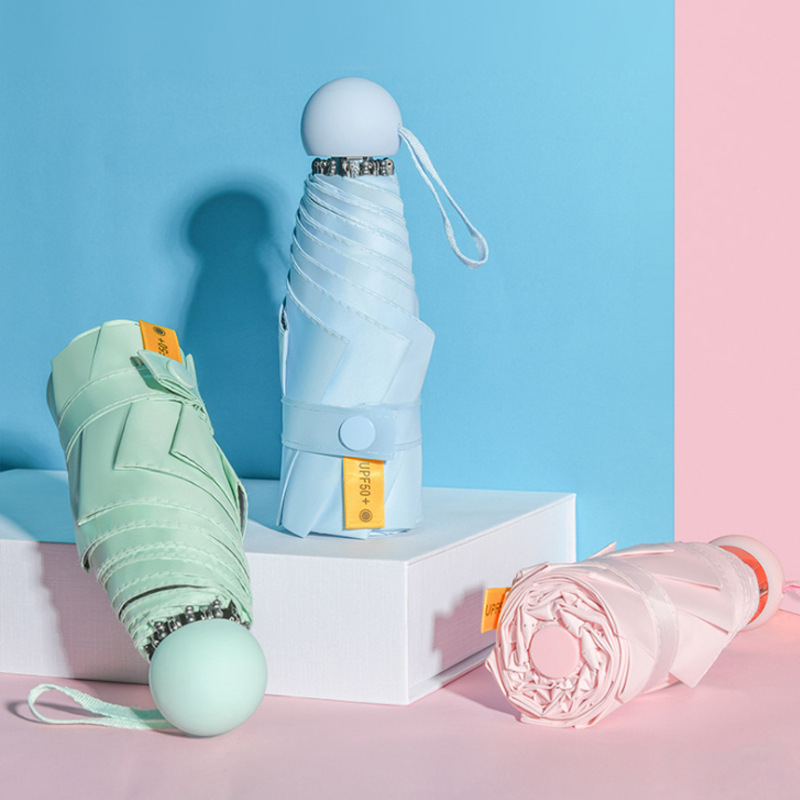 Umbrelă capsulă cu cinci segmente, de buzunar, protecție UV UPF50+, țesătură 190T, 6 brațe, tijă din oțel, mâner din plastic, deschidere manuală, umbrelă publicitară