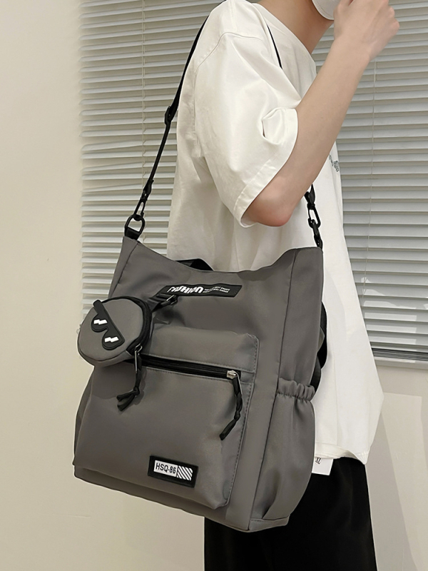 Lányoknak szóló egyvállas keresztpántos iskolai táska – nejlon, kopásálló, bővíthető kapacitás, terheléscsökkentés, kompakt tárolásra