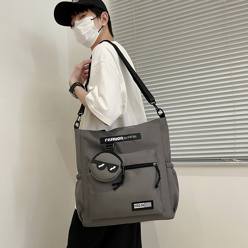 Lányoknak szóló egyvállas keresztpántos iskolai táska – nejlon, kopásálló, bővíthető kapacitás, terheléscsökkentés, kompakt tárolásra