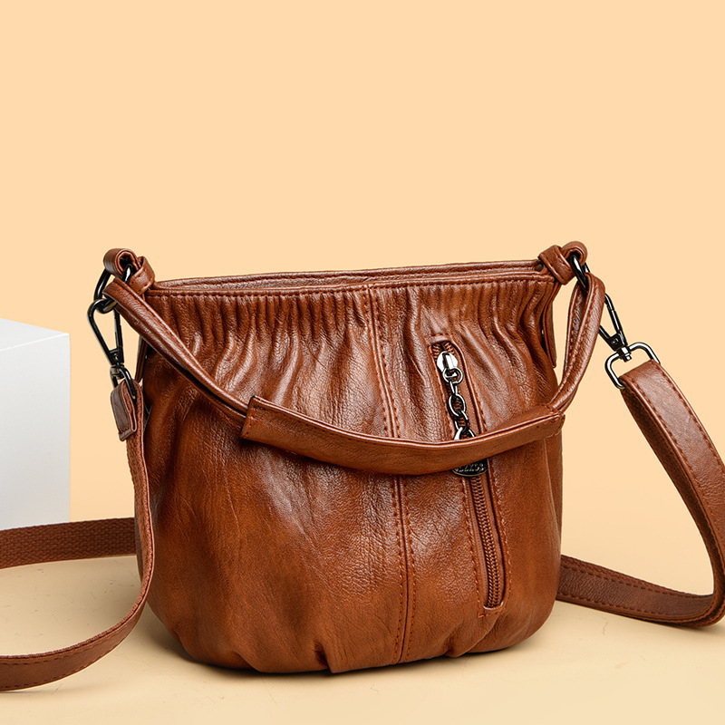 Ženska crossbody bucket torba, PU materijal, street trend stil, zatvarač, poliester podstava