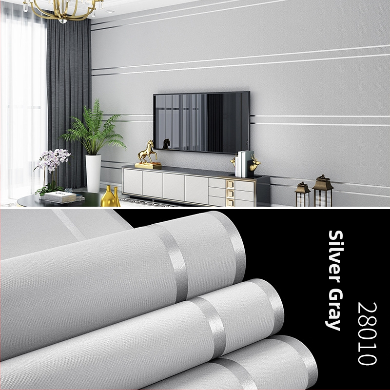 Huda Wallpaper tapetes — nešūts materiāls, velūra tekstūra, ziemeļniecisks ģeometriskais raksts, vertikālas un horizontālas svītras, mūsdienīgs minimālistiska dzīvojamās istabas fons