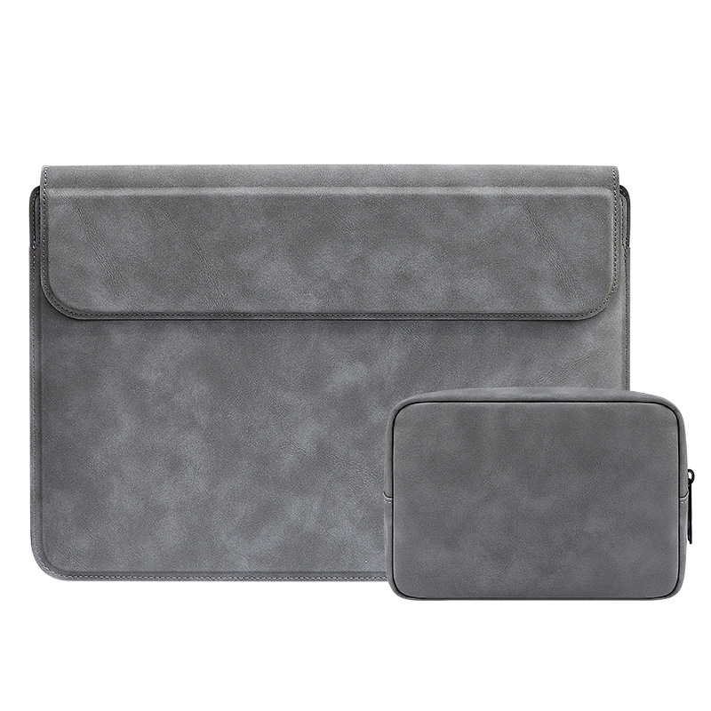 Torba za prijenosno računalo s poklopnim otvaranjem; podstava; unutarnja pretinica za računalo; vodootporna i otporna na udarce; poslovni clutch stil