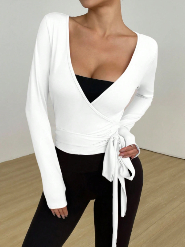 Спортна тениска с V-образно деколте, дълги ръкави, слабо прилепнала кройка, полиестер, еднотонна материя