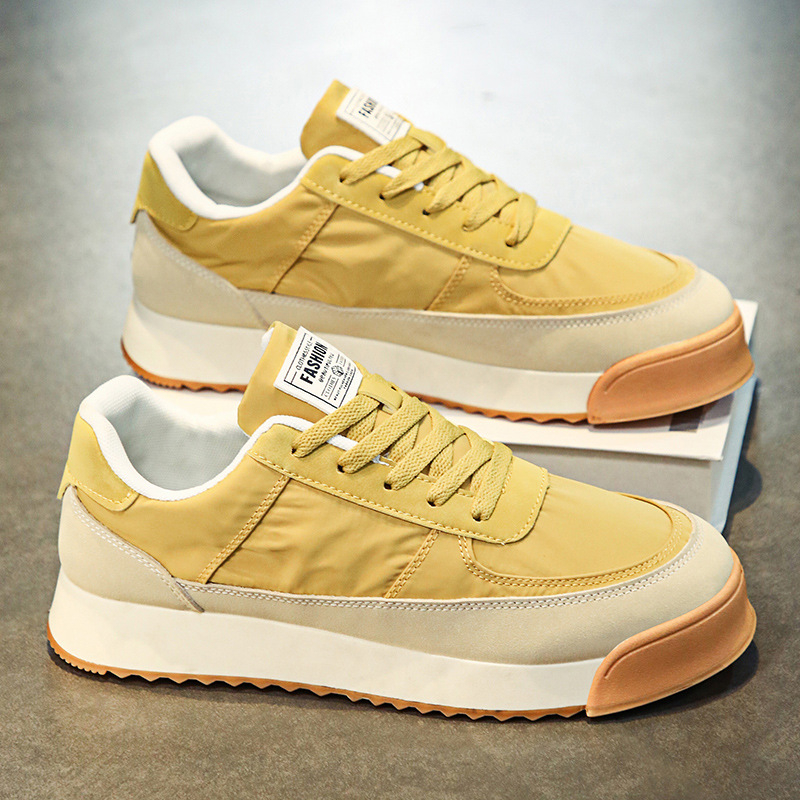Uniszex alacsony profilú fűzős sneaker, color-block mintázat, felsőrész esernyőanyagból, PVC talp, 3–5 cm sarok