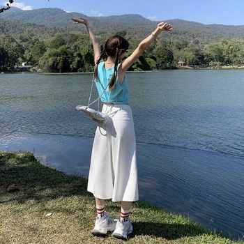 Magas derekú, széles szárú farmernadrág, Capri hosszúságú, pamut 80–90% és poliészter, városi stílus, tavasz 2025