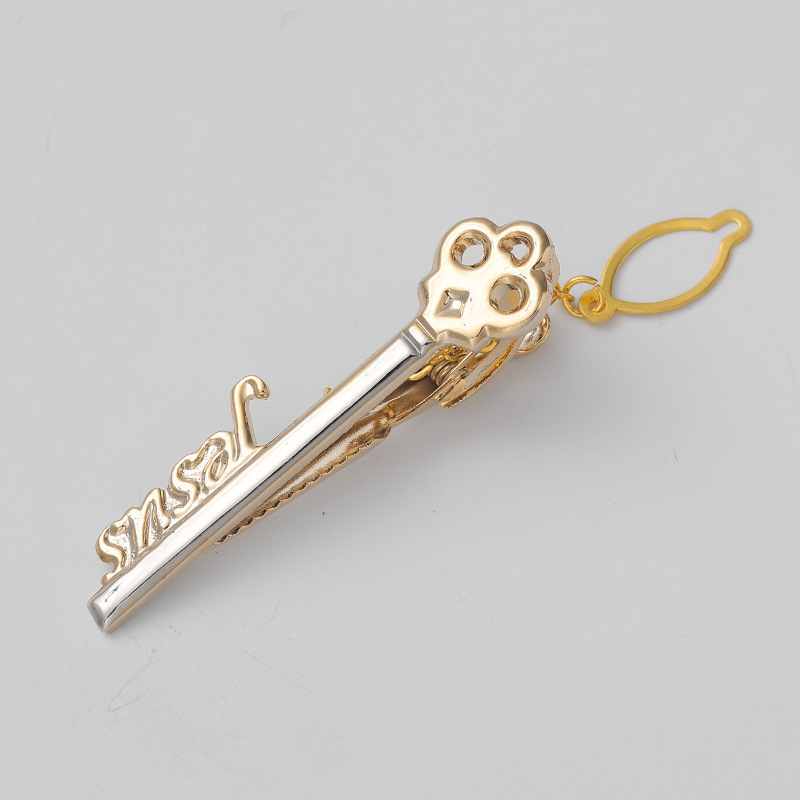 Divu tonnu kaklasaistes klips; materiāls: vara; motīvi: muzikālais instruments, lidmašīna, burāšana; stils: plakana galva; universāls; apstrāde: elektroplakēšana; izcelsme: Zhejiang