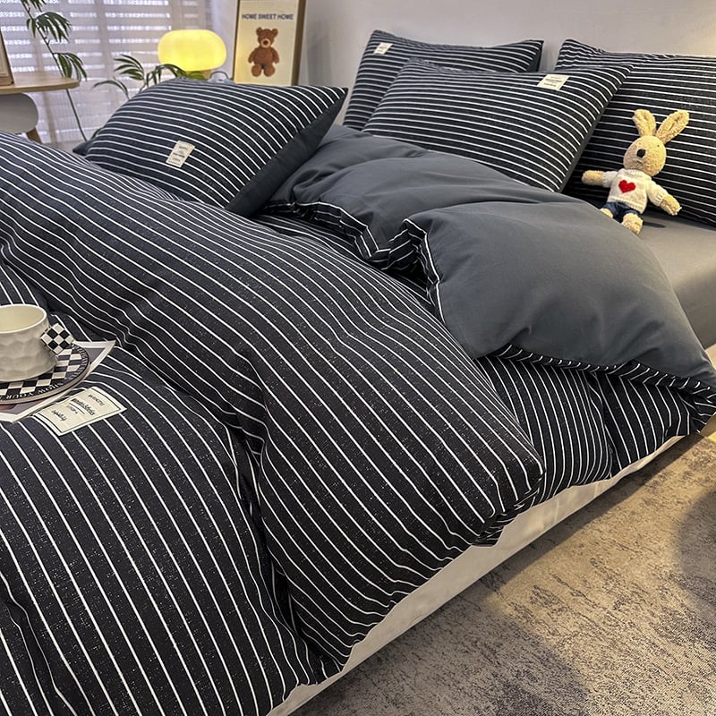 Kokvilnas četrdaļīgs gultas veļas komplekts studentu nometnei — reaktīvā drukāšana, pūstā audums, svars 2500–3000 g, vienkrāsains raksts