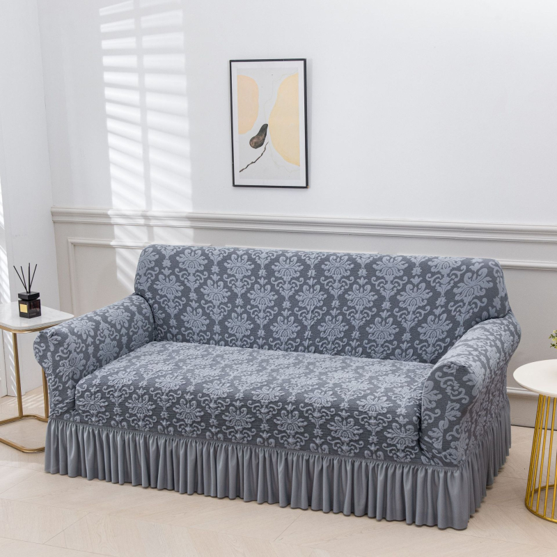 Kanapévédő szoknya-stílusú, rugalmas, csúszásmentes jacquard mintázatú, poliészter.