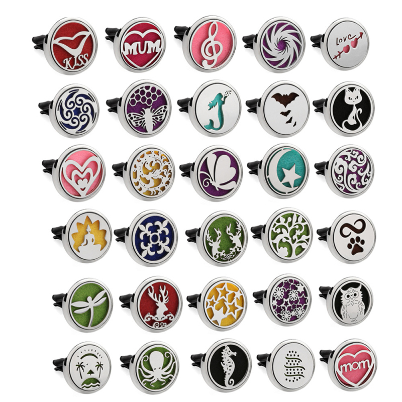 Clip aromaterapie auto, corp metalic, montaj la gurile de aer, parfum floral, conținut <5 ml, volatilizare 1–15 zile