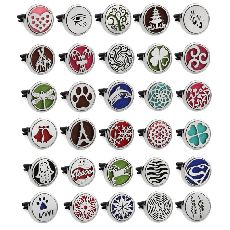 Clip aromaterapie auto, corp metalic, montaj la gurile de aer, parfum floral, conținut <5 ml, volatilizare 1–15 zile