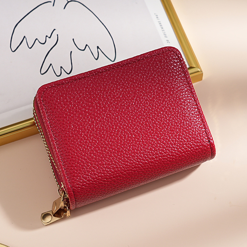 Naiste kaarditasku akordionistiil, topelt tõmblukk, mitu kaardisalvet, PU materjal, sünteetilise naha vooder, linnaline lihtne stiil