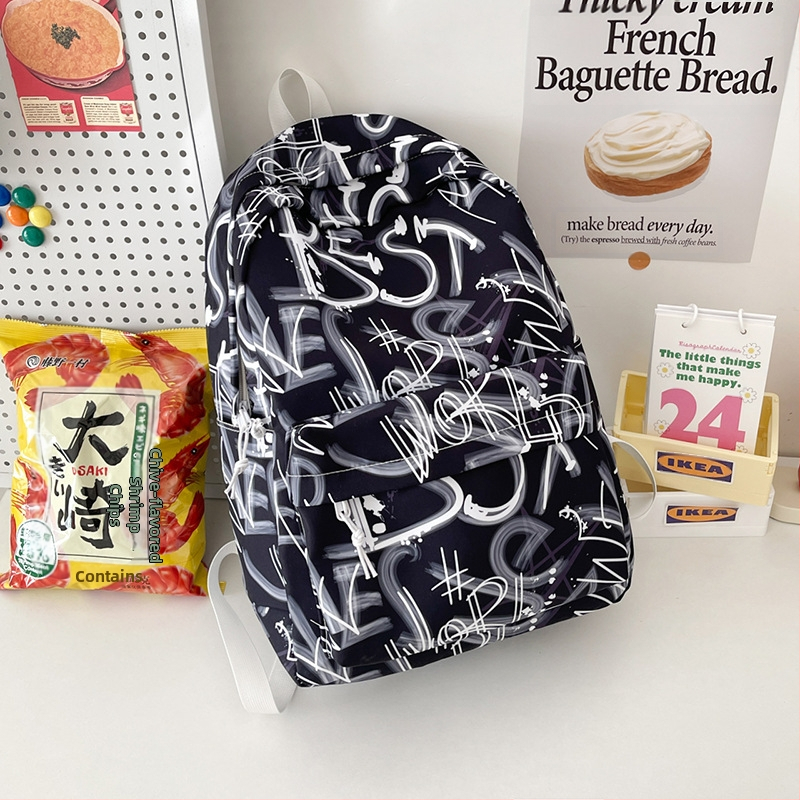 Lányok iskolai hátizsák – ultrakönnyű, nagy kapacitású, nylonból, légpárnás vállpántokkal, poliészter bélés, betűmintás dizájn, iskola használatra