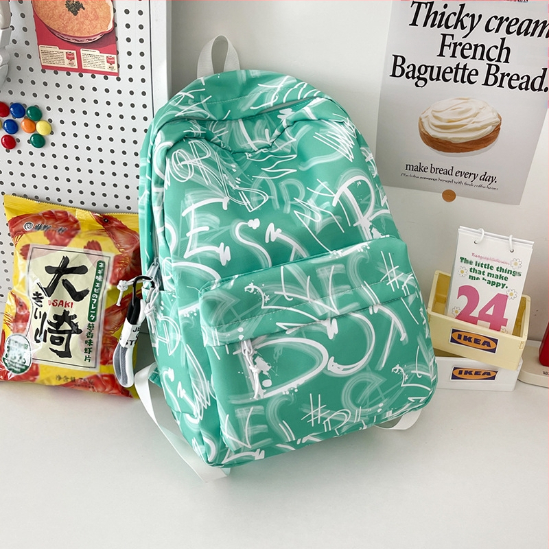 Lányok iskolai hátizsák – ultrakönnyű, nagy kapacitású, nylonból, légpárnás vállpántokkal, poliészter bélés, betűmintás dizájn, iskola használatra