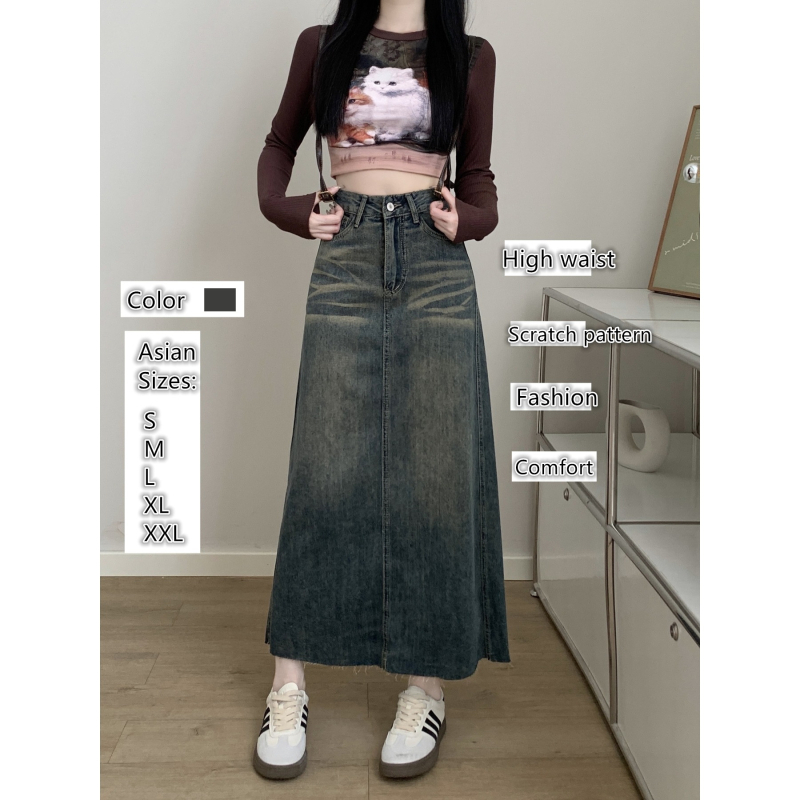 Ženska traper suknja, visokim strukom, A-linija, srednje duljine, obrub na kraju, sastav: pamuk 50–70%, poliester 30–50%